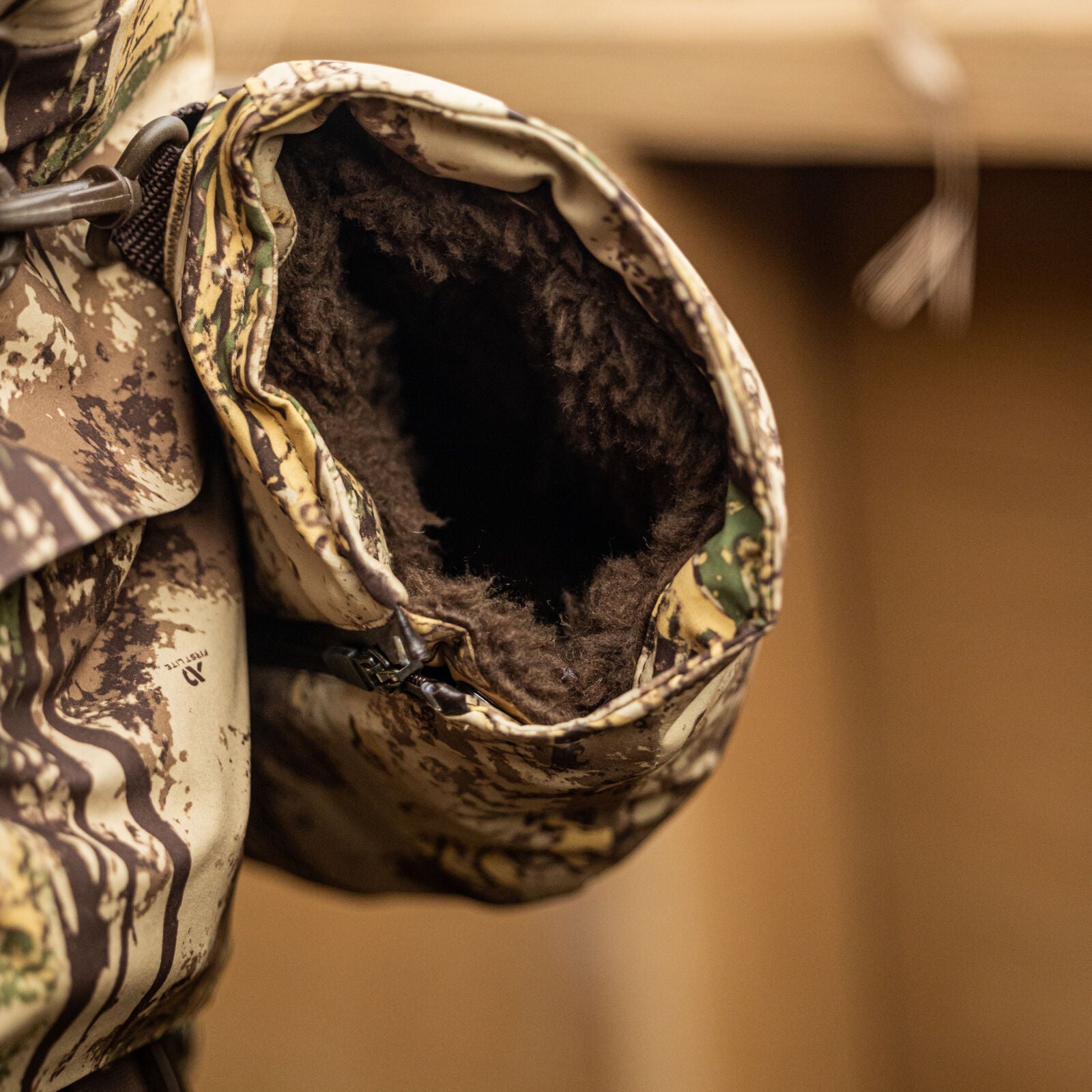 First Lite Refuge Muff typha inside