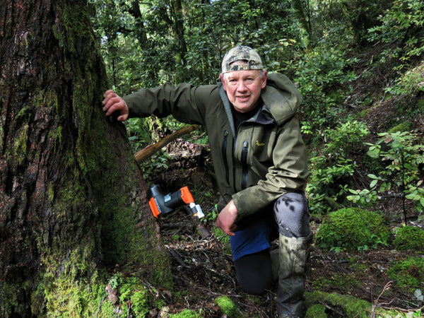 new zealand hunter setting good nature trap
