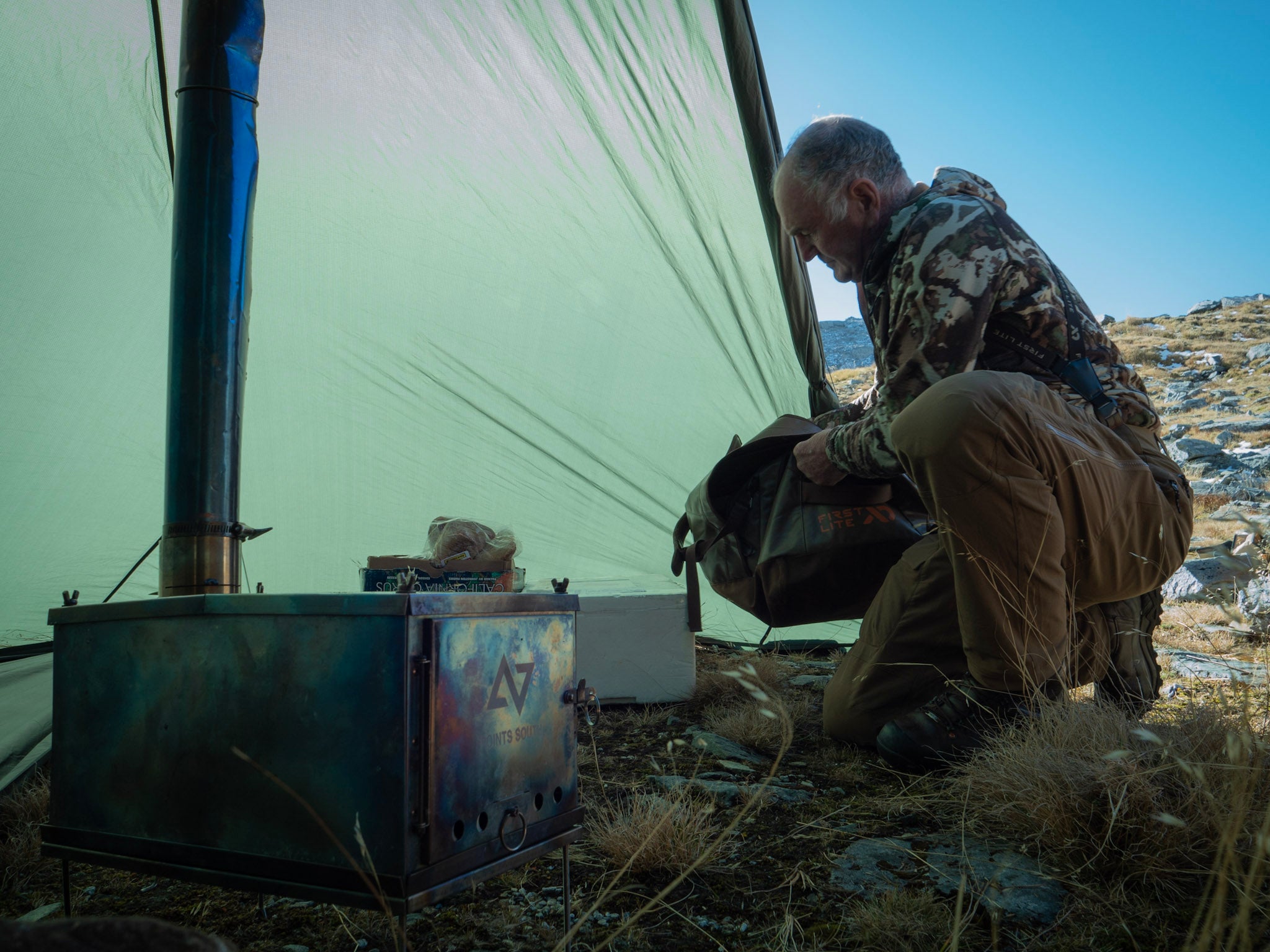 PointsSouth tipi stove titanium in field 